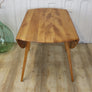 vintage_ercol_drop_leaf_oval_dining_table
