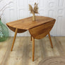 vintage_ercol_drop_leaf_oval_dining_table