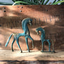 A Pair of Vintage Bronze 'Horse' Ornaments