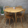 mid-century_ercol_elm_drop_leaf_round_dining_table_model_384