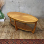 mid_century_oval_teak_coffee_table