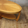 mid_century_oval_teak_coffee_table