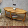 mid_century_oval_teak_coffee_table