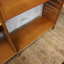 mid_century_teak_staples_ladderax_modular_storage_shelving.robert_heal
