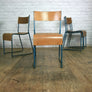 A Set of Four (4) Vintage Tubular Steel Stacking Chairs - BLUE