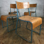 A Set of Four (4) Vintage Tubular Steel Stacking Chairs - BLUE