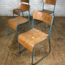 A Set of Four (4) Vintage Tubular Steel Stacking Chairs - BLUE
