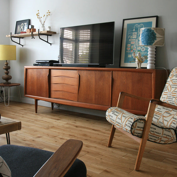 Gunni Omann sideboard, E-Gomme 'siesta' armchair, Gimson & Slater armchair, coffee tables, shelf and homewares