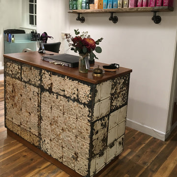 Vintage Haberdashery Counter with reclaimed ceiling tile cladding