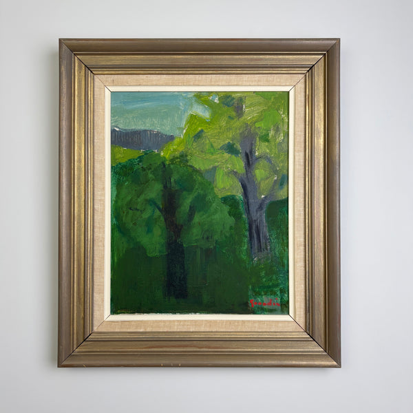 A framed vintage Swedish landscape painting featuring vibrant green trees, presented in a rustic brown wooden frame with a gold inner border, mounted on a light gray wall.