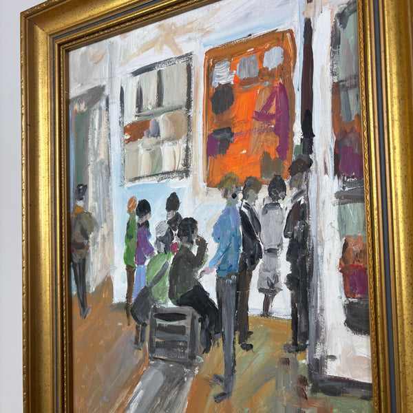 A vintage framed painting depicting a group of people gathered inside a room, rendered in expressive brushstrokes with warm orange, white, gray, and black tones. The artwork is enclosed in a wide ornate gold frame.
