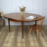 mid_century_g_plan_fresco_teak_round_oval_dining_table