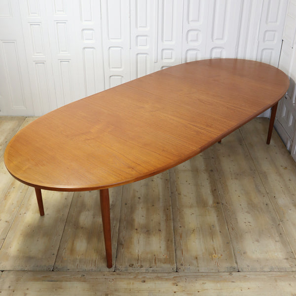 mid_century_teak_danish_arne_vodder_212_extending_oval_dining_table