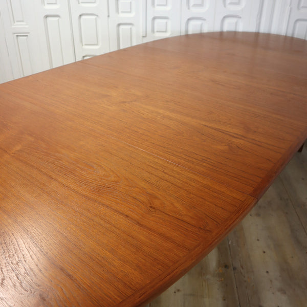 mid_century_teak_danish_arne_vodder_212_extending_oval_dining_table