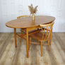 vintage_elm_midcentury_oval_extending_table