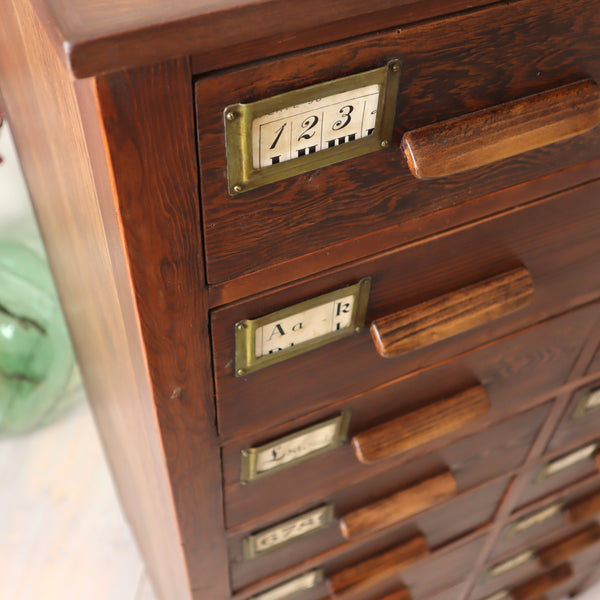 vintage_large_apothecary_pitch_pine_bank_of_drawers_architect