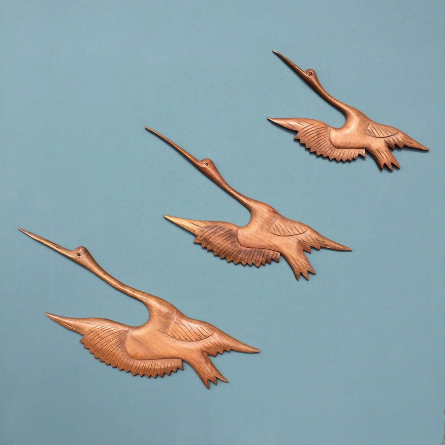 Trio of teak mid century flying cranes