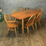 mid_century_ercol_ercolani_elm_plank_dining_table