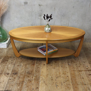 mid_century_oval_teak_coffee_table