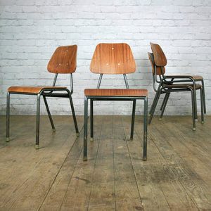 A Set of Four (4) Vintage Industrial Danish Teak School Stacking Chairs