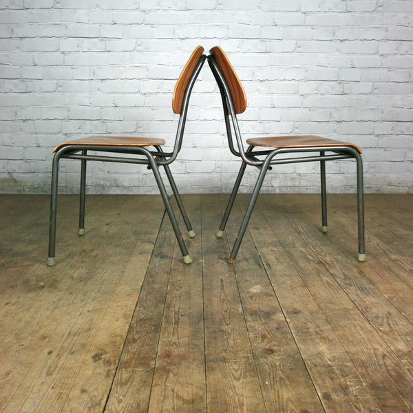 A Set of Four (4) Vintage Industrial Danish Teak School Stacking Chairs
