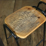 A Set of Three Rustic Bar Height Stools