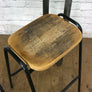 A Set of Three Rustic Bar Height Stools