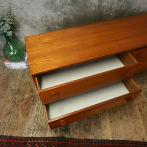 vintage_teak_mid_century_symbol_sideboard_drawers