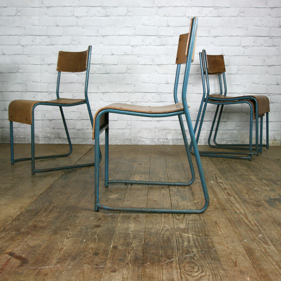 A Set of Four (4) Vintage Tubular Steel Stacking Chairs - BLUE
